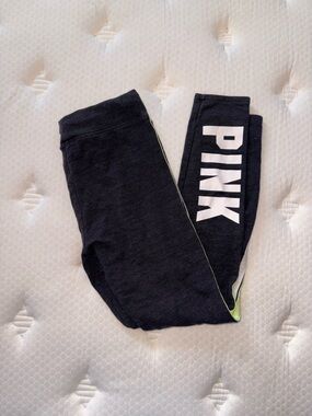 27. PINK Victoria's Secret Black Leggings with White Logo and Neon Trim